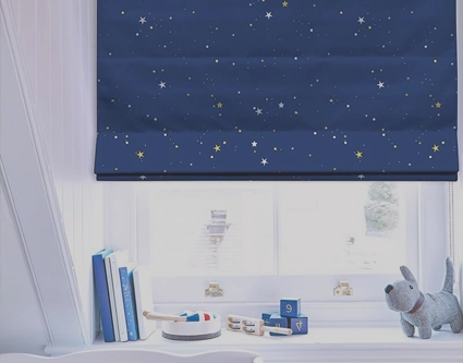 A beautiful collection of stylish children's roman blinds in a variety of cheerful prints.