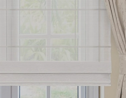 A stunning collection of sheer roman blinds made using a unique method that hides the rod pockets