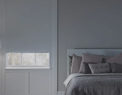 Total blackout roller blinds use a cassette with side channels to block all light from your windows.